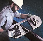 Hand-held pneumatic band saw